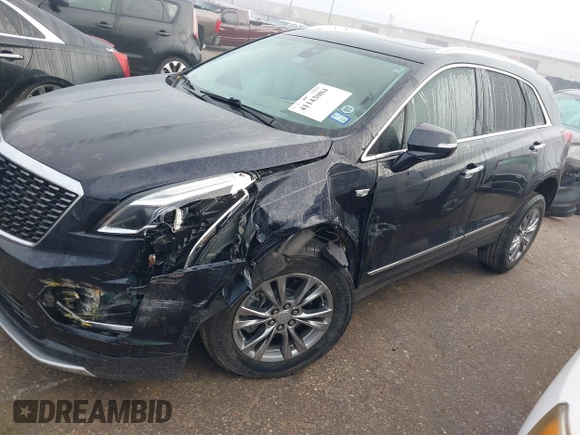 2021 Cadillac XT5 FWD Premium Luxury with VIN 1GYKNCRS2MZ185678, listed as a IAAI auction lot 41143084 with 25,399 mi miles and . Bid and sale history available at carsss.com. Image 6.