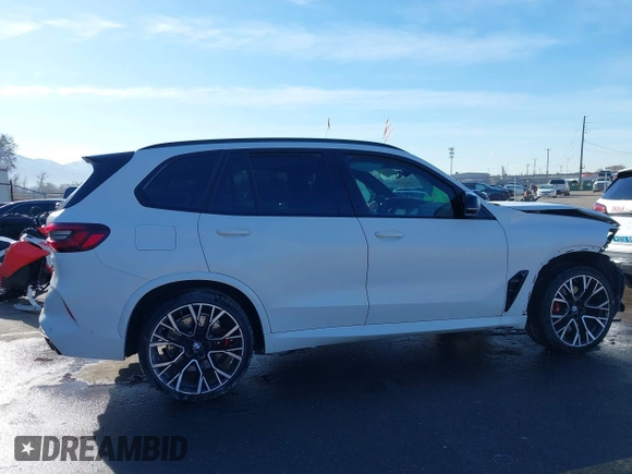 2022 BMW X5 M with VIN 5YMJU0C02N9K39077, listed as a IAAI auction lot 41711996 with 11,875 mi miles. Bid and sale history available at carsss.com. Image 14.