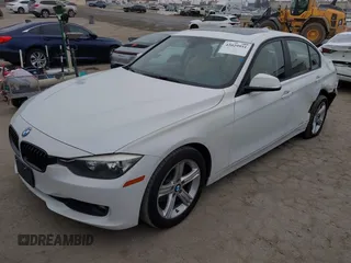 2014 BMW 3 Series 320i with VIN WBA3B1G58ENS80160, listed as a IAAI auction lot 42029951 with 97,306 mi miles. Bid and sale history available at carsss.com. Image 2.