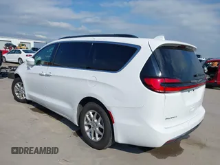2022 Chrysler Pacifica Touring L with VIN 2C4RC1BG8NR197706, listed as a IAAI auction lot 42414290 with 56,972 mi miles and . Bid and sale history available at DreamBid. Image 3.
