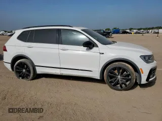 2021 Volkswagen Tiguan SE z VIN 3VV3B7AX9MM003432, wystawiony jako Copart lot #63422315 z przebiegiem 64 531 mil mil oraz Czysty tytuł • Clean title. Historia ofert i sprzedaży dostępna na DreamBid. Obrazek 4.