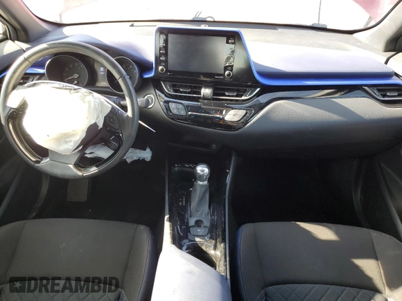 2020 Toyota C-HR LE with VIN JTNKHMBX6L1094205, listed as a Copart auction lot 63513674 with 34,596 mi miles and Salvage Title. Bid and sale history available at DreamBid. Image 8.