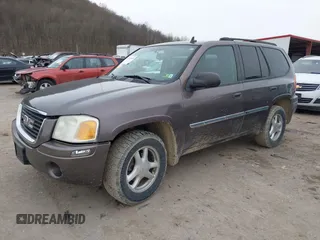 2008 GMC Envoy SLE2 with VIN 1GKDT13S482236375, listed as a IAAI auction lot 41510610 with 183,716 mi miles. Bid and sale history available at carsss.com. Image 2.