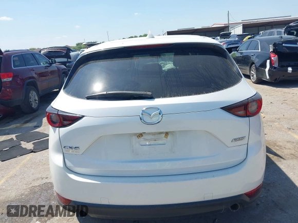 2019 Mazda CX-5 Touring with VIN JM3KFACM7K1656311, listed as a IAAI auction lot 41833187 with 83,888 mi miles. Bid and sale history available at carsss.com. Image 16.