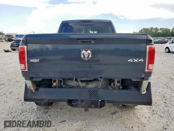 2014 Ram 2500 Laramie z VIN 3C6UR5FL4EG183158, wystawiony jako Copart lot #61846925 z przebiegiem 199 961 mil mil oraz Szkoda całkowita • Salvage title. Historia ofert i sprzedaży dostępna na DreamBid. Obrazek 6.