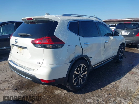 2018 Nissan Rogue S with VIN JN8AT2MT4JW469784, listed as a IAAI auction lot 41827157 with 67,838 mi miles and . Bid and sale history available at carsss.com. Image 4.