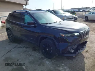 2021 Jeep Cherokee Latitude Lux with VIN 1C4PJMMX1MD216254, listed as a IAAI auction lot 41947214 with 35,445 mi miles and . Bid and sale history available at DreamBid. Image 1.