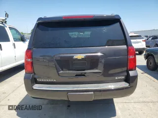 2018 Chevrolet Suburban Premier with VIN 1GNSCJKC4JR189639, listed as a Copart auction lot 64221035 with 110,256 mi miles and Salvage title. Bid and sale history available at DreamBid. Image 6.