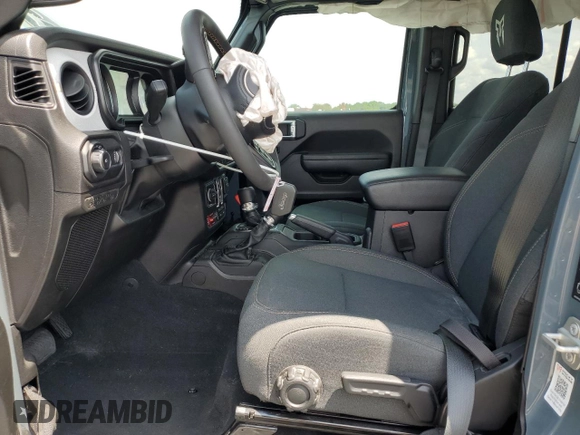 2024 Jeep Wrangler Sport S with VIN 1C4PJXDG3RW229567, listed as a Copart auction lot 55307335 with 7,797 mi miles and Salvage Title. Bid and sale history available at DreamBid. Image 7.