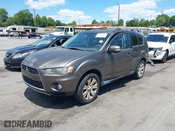 2012 Mitsubishi Outlander SE z VIN JA4AS3AW7CU014570, wystawiony jako IAAI lot #42340449 z przebiegiem 116 127 mil mil oraz . Historia ofert i sprzedaży dostępna na DreamBid. Obrazek 2.