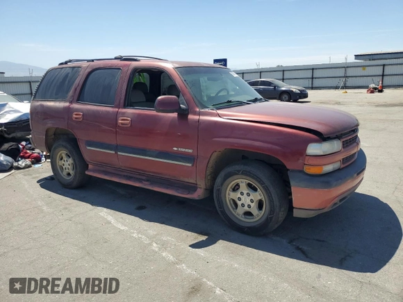 2001 Chevrolet Tahoe LT with VIN 1GNEC13T71R164164, listed as a Copart auction lot 60066165 with 234,506 mi miles and Salvage title. Bid and sale history available at DreamBid. Image 4.