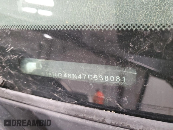 2007 Jeep Commander Sport z VIN 1J8HG48N47C638081, wystawiony jako Copart lot #51793315 z przebiegiem Nie podano mil oraz Szkoda całkowita • Salvage title. Historia ofert i sprzedaży dostępna na DreamBid. Obrazek 14.