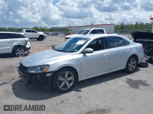 2015 Volkswagen Passat 1.8T Limited Edition with VIN 1VWAT7A35FC109653, listed as a IAAI auction lot 41917568 with 118,912 mi miles. Bid and sale history available at carsss.com. Image 2.