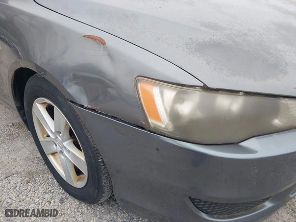 2008 Mitsubishi Lancer DE with VIN JA3AU26U48U012900, listed as a IAAI auction lot 41988059 with 216,797 mi miles. Bid and sale history available at carsss.com. Image 6.