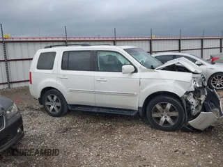 2012 Honda Pilot Touring z VIN 5FNYF4H93CB030515, wystawiony jako IAAI lot #41936563 z przebiegiem Nie podano mil oraz . Historia ofert i sprzedaży dostępna na DreamBid. Obrazek 12.