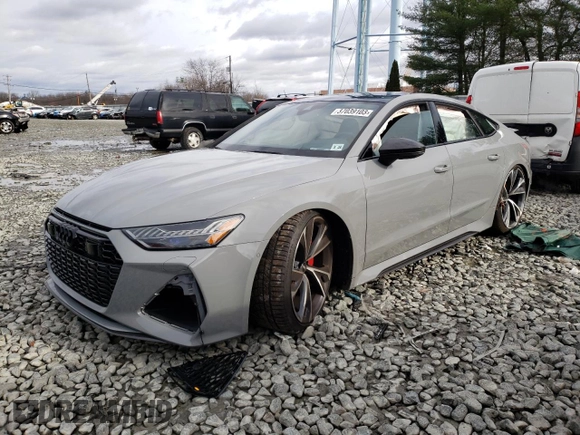 2021 Audi RS 7 z VIN WUAPCBF26MN906501, wystawiony jako Copart lot #37039103 z przebiegiem Nie podano mil oraz . Historia ofert i sprzedaży dostępna na DreamBid. Obrazek 1.