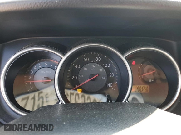 2007 Nissan Versa SL z VIN 3N1BC11E77L451507, wystawiony jako Copart lot #59663715 z przebiegiem 132 363 mil mil oraz Szkoda całkowita • Salvage title. Historia ofert i sprzedaży dostępna na DreamBid. Obrazek 9.