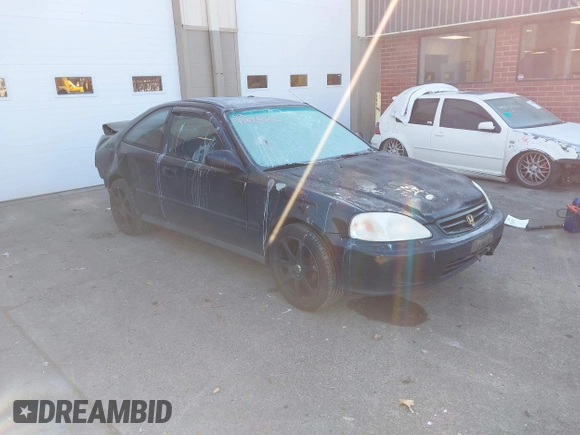 1999 Honda Civic HX with VIN 1HGEJ7120XL038544, listed as a IAAI auction lot 41425202 with 336,033 mi miles. Bid and sale history available at carsss.com. Image 1.