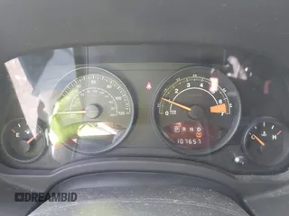 2014 Jeep Patriot Latitude with VIN 1C4NJRFB1ED846282, listed as a IAAI auction lot 41912886 with 107,657 mi miles. Bid and sale history available at carsss.com. Image 7.
