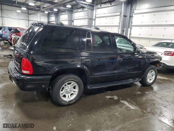 2003 Dodge Durango SLT with VIN 1D4HS48N93F512154, listed as a Copart auction lot 83899794 with 138,338 mi miles and Salvage Title. Bid and sale history available at carsss.com. Image 3.