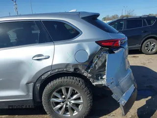 2018 Mazda CX-9 Touring with VIN JM3TCACY9J0219396, listed as a IAAI auction lot 41700710 with 123,383 mi miles and . Bid and sale history available at carsss.com. Image 6.