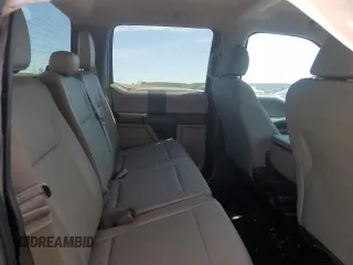 2015 Ford F-150 XLT with VIN 1FTEW1EF9FKE55062, listed as a Copart auction lot 46934545 with 148,430 mi miles and Salvage title. Bid and sale history available at DreamBid. Image 10.