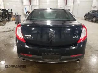2014 Lincoln MKS with VIN 1LNHL9DK3EG611354, listed as a Copart auction lot 49008525 with 114,232 mi miles and Salvage Title. Bid and sale history available at carsss.com. Image 6.