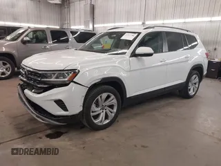 2021 Volkswagen Atlas SE z VIN 1V2HR2CA3MC539997, wystawiony jako IAAI lot #41977786 z przebiegiem 77 372 mil mil oraz . Historia ofert i sprzedaży dostępna na DreamBid. Obrazek 2.
