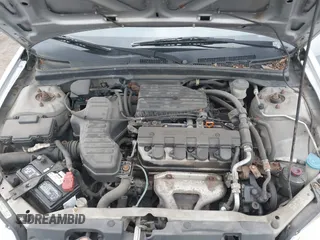 2001 Honda Civic LX with VIN 1HGES16541L049356, listed as a IAAI auction lot 42166564 with 207,913 mi miles. Bid and sale history available at carsss.com. Image 10.