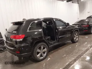 2014 Jeep Grand Cherokee Limited with VIN 1C4RJFBG4EC182065, listed as a IAAI auction lot 42291900 with 131,868 mi miles and . Bid and sale history available at DreamBid. Image 4.