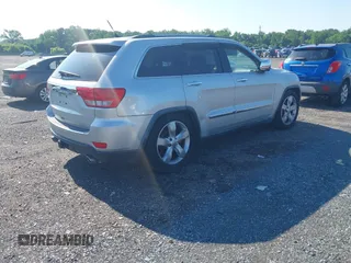 2011 Jeep Grand Cherokee Overland Summit with VIN 1J4RR6GT9BC535985, listed as a IAAI auction lot 42556913 with 108,845 mi miles and . Bid and sale history available at DreamBid. Image 4.