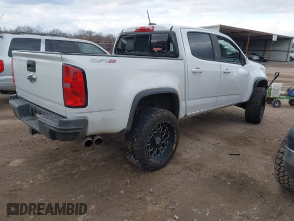 2018 Chevrolet Colorado 4WD ZR2 with VIN 1GCGTEEN3J1295176, listed as a IAAI auction lot 41418943 with 57,621 mi miles. Bid and sale history available at carsss.com. Image 4.