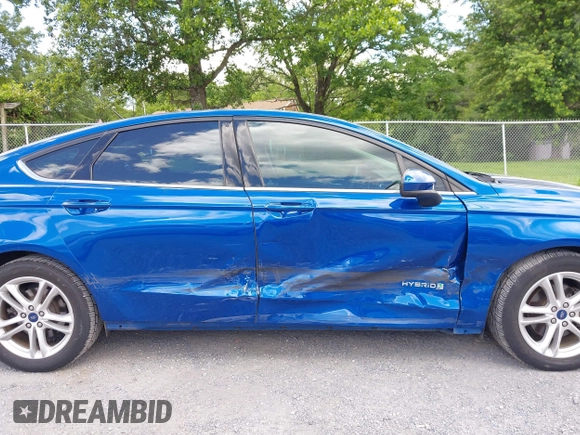 2018 Ford Fusion SE z VIN 3FA6P0LU9JR171096, wystawiony jako IAAI lot #42329683 z przebiegiem 126 463 mil mil oraz . Historia ofert i sprzedaży dostępna na DreamBid. Obrazek 17.