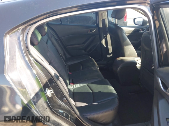 2014 Mazda 3 i Grand Touring z VIN JM1BM1M78E1159912, wystawiony jako IAAI lot #42079661 z przebiegiem 105 039 mil mil oraz . Historia ofert i sprzedaży dostępna na DreamBid. Obrazek 8.