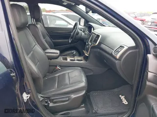 2014 Jeep Grand Cherokee Laredo with VIN 1C4RJEAG0EC120206, listed as a IAAI auction lot 41875054 with 180,153 mi miles. Bid and sale history available at carsss.com. Image 5.