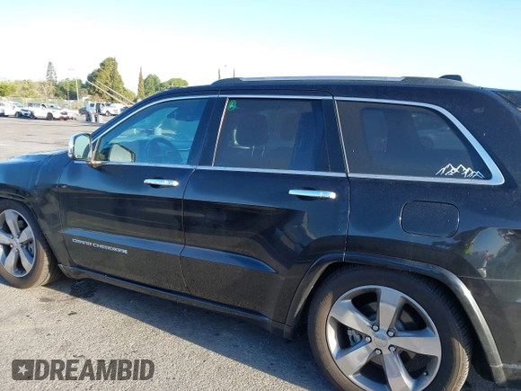 2014 Jeep Grand Cherokee Overland with VIN 1C4RJFCT5EC221015, listed as a IAAI auction lot 41959844 with 78,367 mi miles and . Bid and sale history available at DreamBid. Image 15.