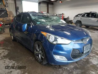 2017 Hyundai Veloster with VIN KMHTC6AD2HU321319, listed as a IAAI auction lot 41919334 with 104,677 mi miles. Bid and sale history available at carsss.com. Image 1.