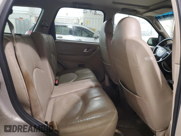 2001 Mazda Tribute LX with VIN 4F2CU08101KM05943, listed as a Copart auction lot 84077694 with 137,937 mi miles and Salvage Title. Bid and sale history available at DreamBid. Image 11.