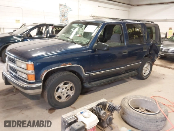 1999 Chevrolet Tahoe Z71 with VIN 1GNEK13R5XJ548832, listed as a IAAI auction lot 42077245 with 208,875 mi miles and . Bid and sale history available at DreamBid. Image 2.