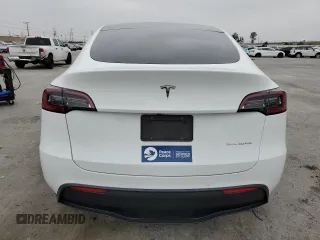 2022 Tesla Model Y Long Range z VIN 7SAYGDEE3NF481660, wystawiony jako Copart lot #54398215 z przebiegiem 48 587 mil mil oraz Szkoda całkowita • Salvage title. Historia ofert i sprzedaży dostępna na DreamBid. Obrazek 6.