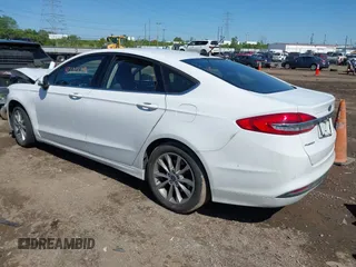 2017 Ford Fusion SE z VIN 3FA6P0H7XHR415299, wystawiony jako IAAI lot #42232634 z przebiegiem 107 962 mil mil oraz . Historia ofert i sprzedaży dostępna na DreamBid. Obrazek 3.