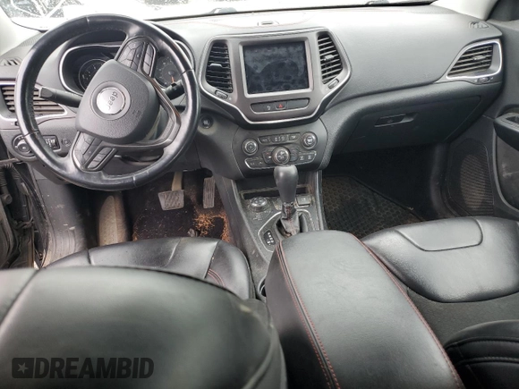 2019 Jeep Cherokee Trailhawk with VIN 1C4PJMBX4KD121641, listed as a Copart auction lot 57128905 with 129,206 mi miles and Salvage title. Bid and sale history available at DreamBid. Image 8.