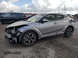 2020 Toyota C-HR LE with VIN JTNKHMBX3L1088894, listed as a Copart auction lot 50986075 with 9,113 mi miles and Salvage Title. Bid and sale history available at carsss.com. Image 1.