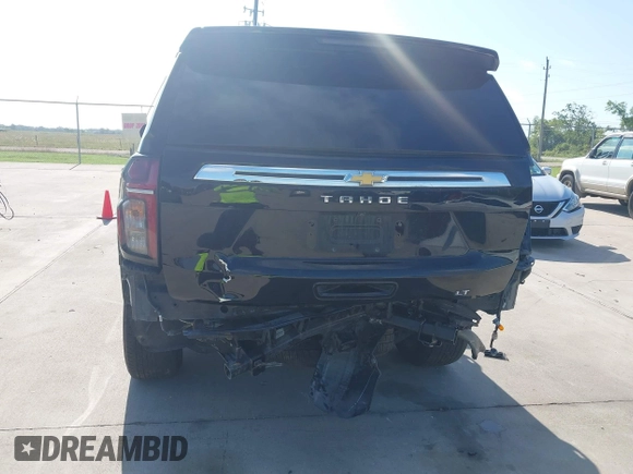 2023 Chevrolet Tahoe LT z VIN 1GNSCNKDXPR477061, wystawiony jako IAAI lot #42225743 z przebiegiem 57 077 mil mil oraz . Historia ofert i sprzedaży dostępna na DreamBid. Obrazek 6.