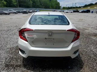 2017 Honda Civic EX-L z VIN 19XFC1F74HE014241, wystawiony jako Copart lot #59005745 z przebiegiem 55 629 mil mil oraz Czysty tytuł • Clean title. Historia ofert i sprzedaży dostępna na DreamBid. Obrazek 6.