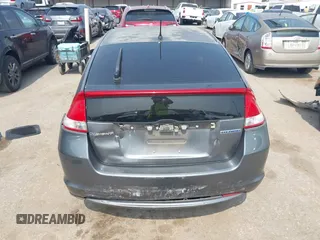 2010 Honda Insight EX with VIN JHMZE2H71AS043465, listed as a IAAI auction lot 42312556 with 151,009 mi miles and . Bid and sale history available at DreamBid. Image 16.