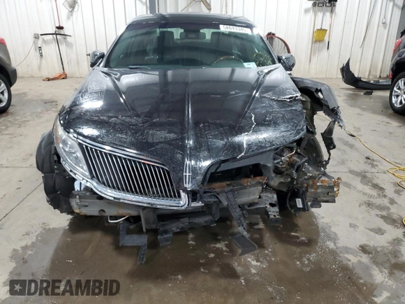2013 Lincoln MKS with VIN 1LNHL9EK8DG611332, listed as a Copart auction lot 58043345 with 118,910 mi miles and Non repairable. Bid and sale history available at DreamBid. Image 5.