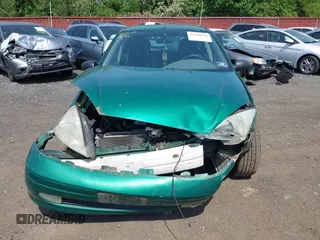2002 Ford Focus ZX5 z VIN 3FAFP373X2R130965, wystawiony jako IAAI lot #42216638 z przebiegiem 59 236 mil mil oraz . Historia ofert i sprzedaży dostępna na DreamBid. Obrazek 12.