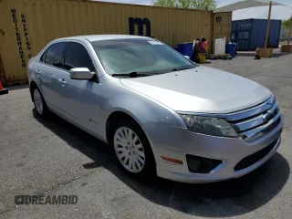 2010 Ford Fusion Hybrid z VIN 3FADP0L39AR273836, wystawiony jako Copart lot #54815095 z przebiegiem 245 960 mil mil oraz Czysty tytuł • Clean title. Historia ofert i sprzedaży dostępna na DreamBid. Obrazek 4.
