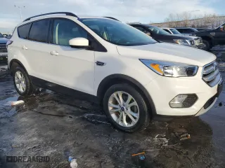 2018 Ford Escape SE with VIN 1FMCU0GDXJUD48551, listed as a Copart auction lot 42595875 with 39,456 mi miles and Salvage Title. Bid and sale history available at carsss.com. Image 4.